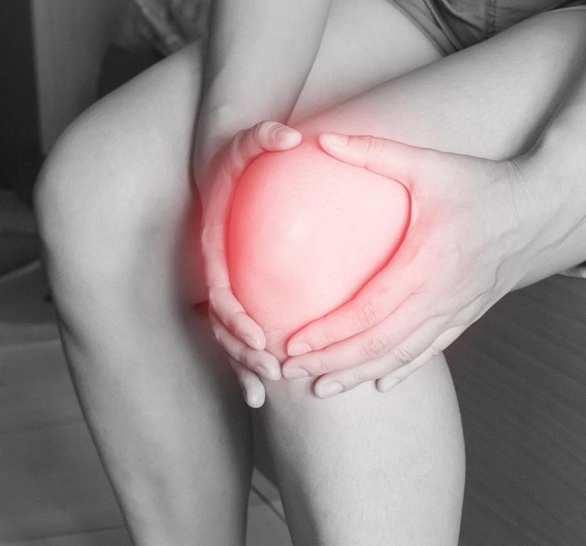 Knie Schmerz rot
